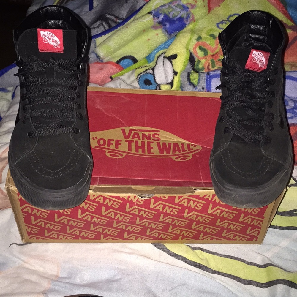 All black Vans of the wall size 9.5